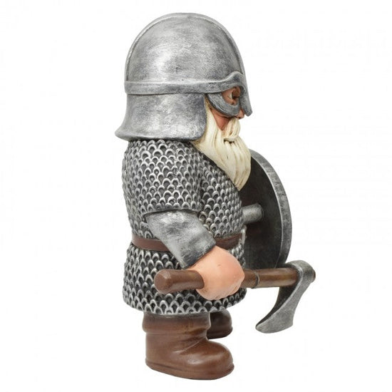 A medieval knight garden gnome figurine wearing silver chainmail armor, a silver helmet, and a white beard, holding a brown axe and a silver shield, shown against a plain white background.
