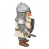 A small medieval knight figurine with a silver chainmail helmet, silver breastplate, white tunic, brown boots, and a shield, shown against a plain white background.