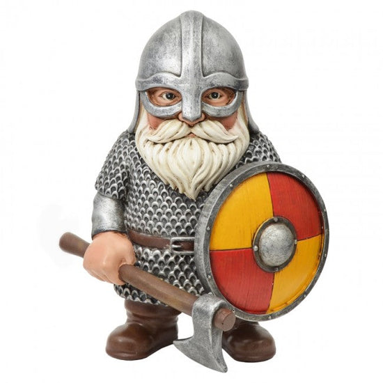 A Viking garden gnome figurine wearing a silver helmet and chainmail armor, holding a shield with red and yellow panels and an axe, on a white background.