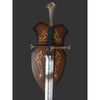 A decorative medieval-style sword with a polished silver blade, black wrapped hilt, and ornate gold detailing, shown alongside a matching dark brown wooden scabbard decorated with gold floral patterns.
