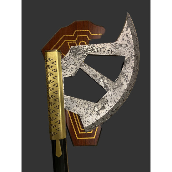 Decorative axe with wooden handle and metallic blade on a dark background