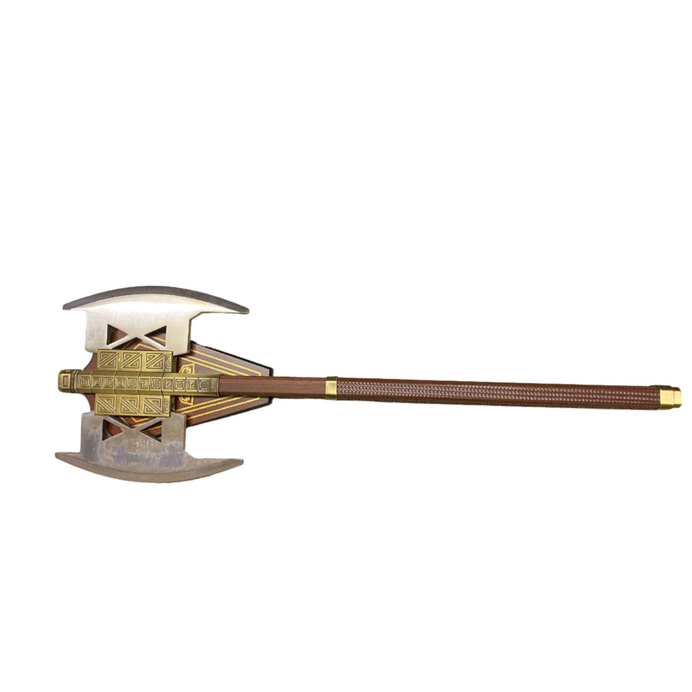 Decorative axe with a detailed head and wooden handle on a white background