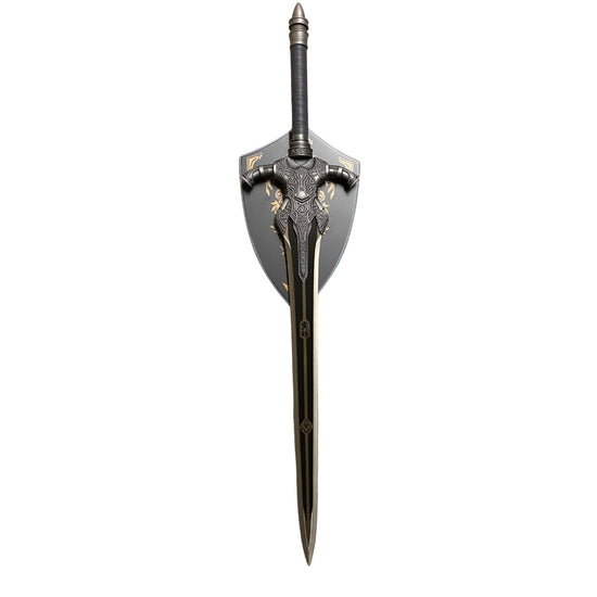 Decorative sword with ornate handle and blade on a white background