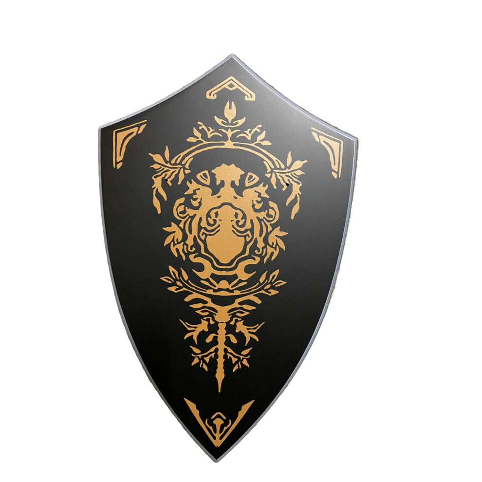 Decorative shield with gold emblem on a black background