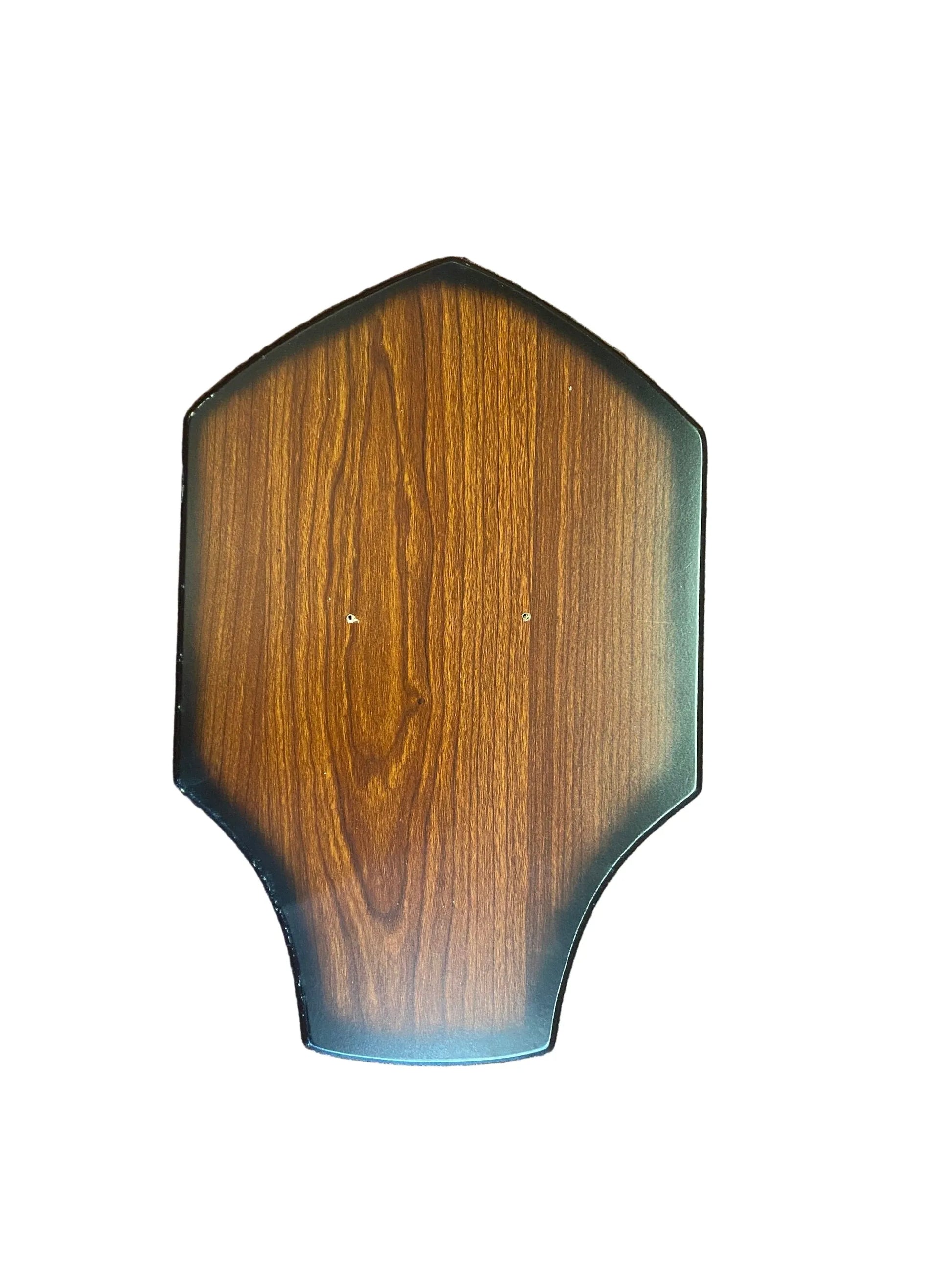 Wooden plaque with a blue border on a textured brown surface