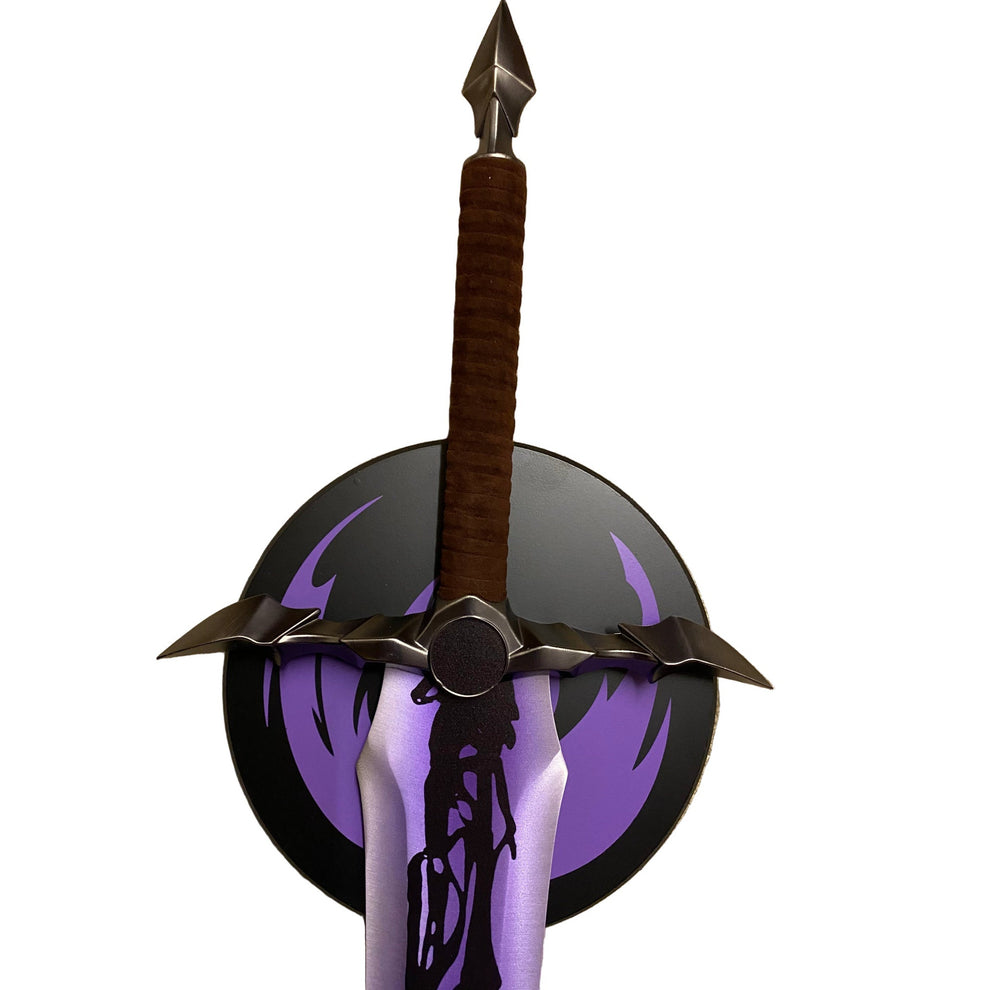 Decorative weapon with a brown handle and metallic blade on a white background