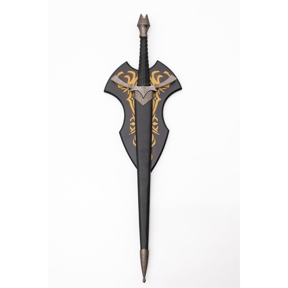 Decorative sword with intricate designs on a white background