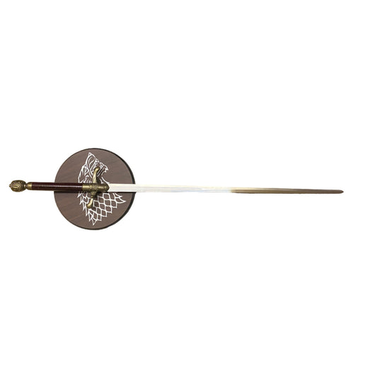 Fencing sword with a round guard featuring a design on a white background