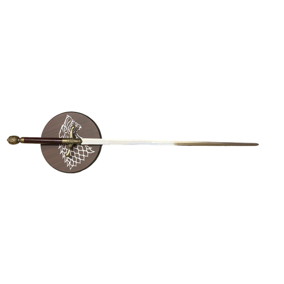 Fencing sword with a round guard featuring a design on a white background