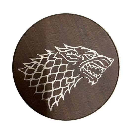 Wooden plaque with a wolf head design on a white background