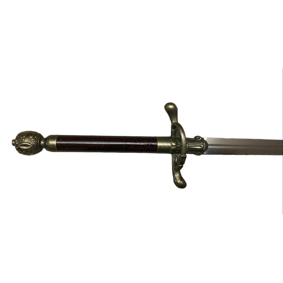 Sword with decorative hilt on a white background