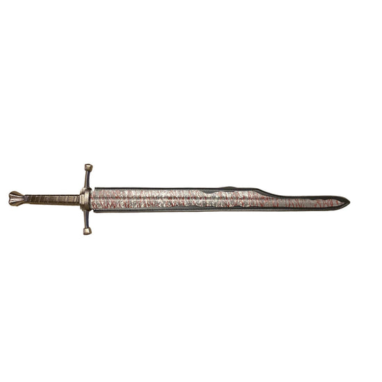 Decorative sword with a detailed handle on a white background