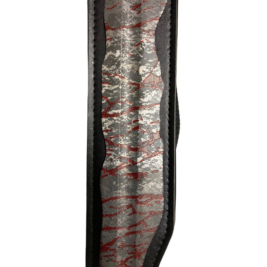 Camouflage-patterned strap with red and gray design on a white background