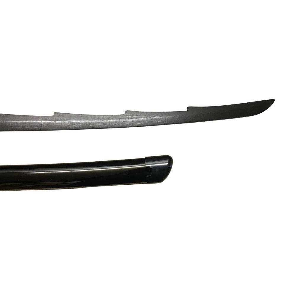 One black curved blade on a white background