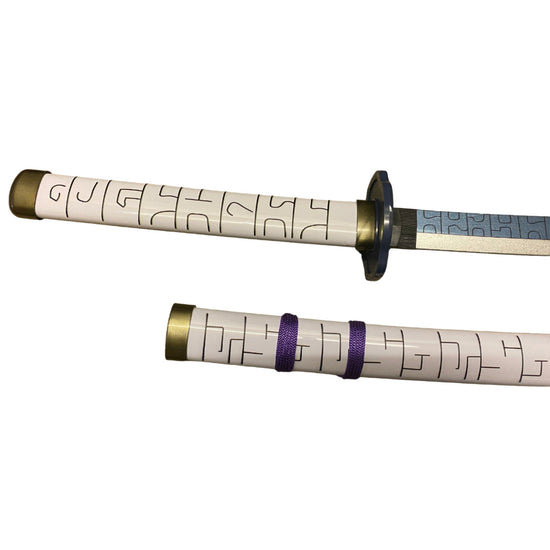 sword handles with decorative patterns on a white background